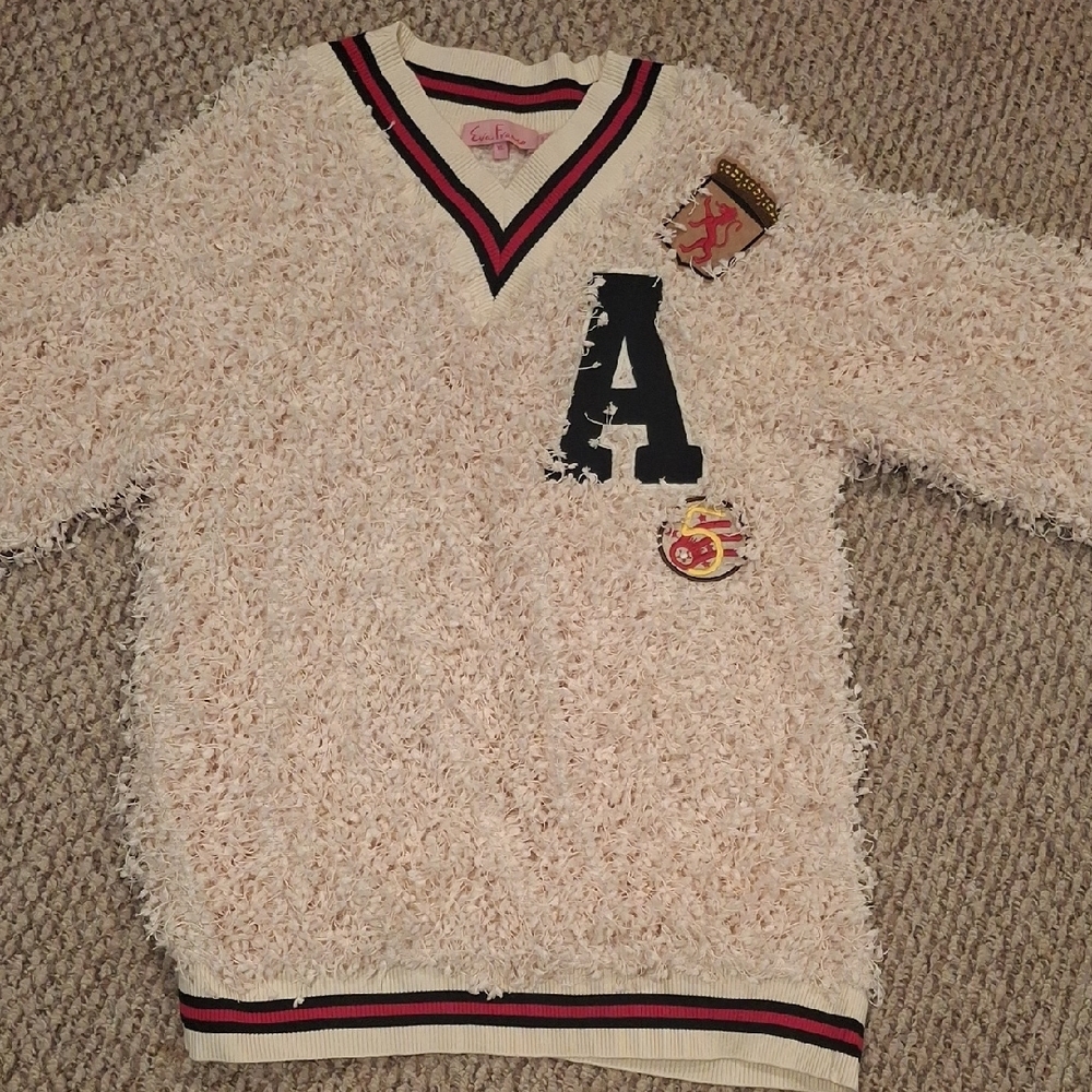 Anthropologie Cozy Cream Sweater with Black Accents